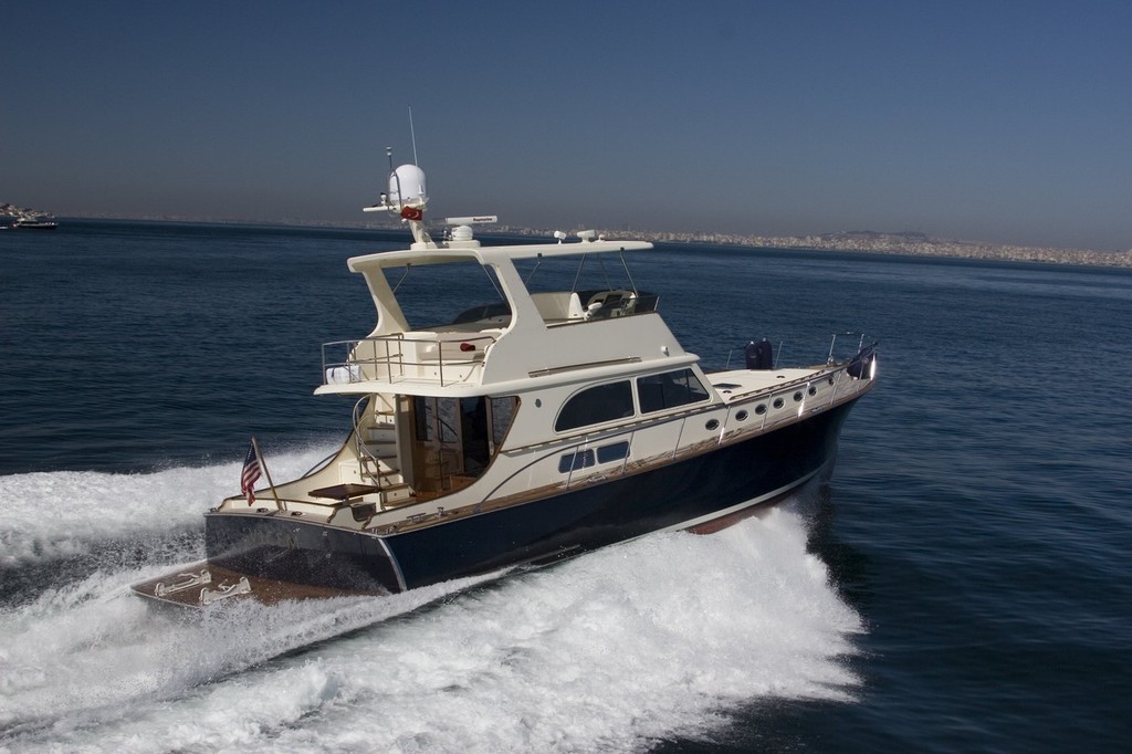 Same boat? Sure is, but this example of the Vicem 58 Cruiser is in flying bridge mode.  © Vicem Yachts